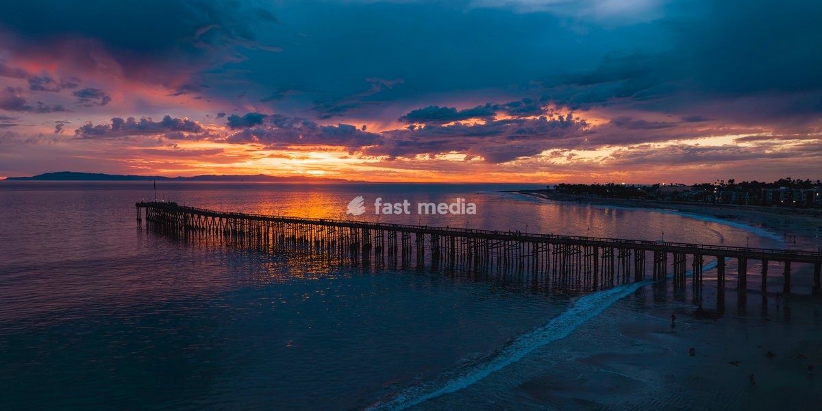 Sunset drone view of 101 and Ventura Pier with Pacific Ocean, Ventura, California