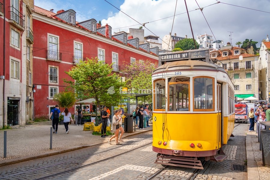 View of vintage tram and colourful architecture in Alfama, Alfama District, Lisbon, Portugal, Europe