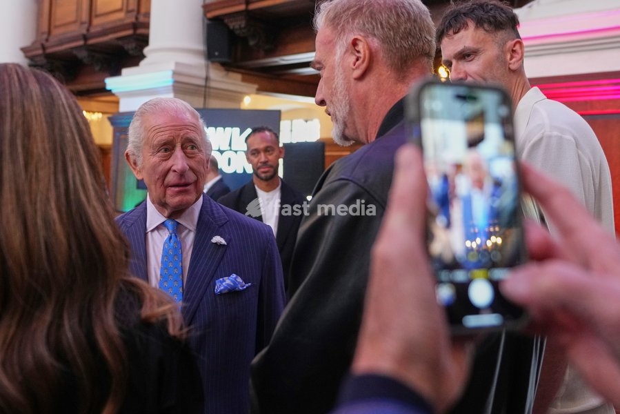 Britain's King Charles speaks to attendees at the South by SouthWest London (SXSW London), a culture, technology and creativity festival in Shoreditch, London, Thursday, June 5, 2025