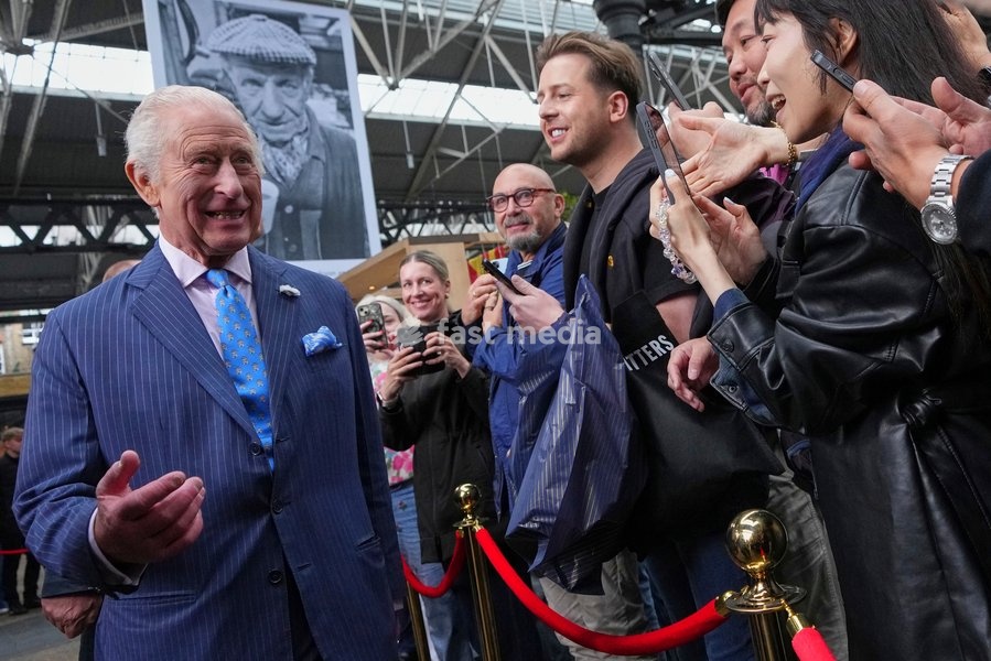 Britain's King Charles greets members of the public as he attends the South by SouthWest London (SXSW London), a culture, technology and creativity festival in Shoreditch, London, Thursday, June 5, 2025