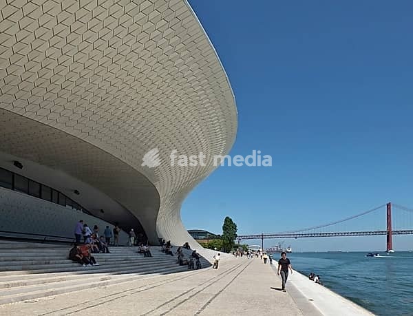 Modern architecture on the banks of the Tagus with the 25 April bridge in the background