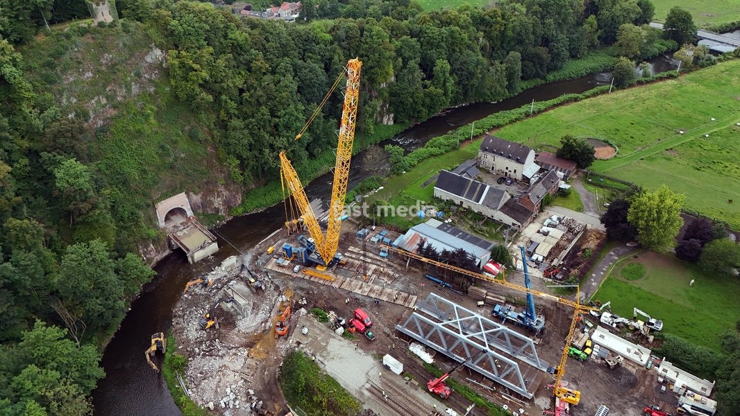Aerial drone picture shows the Infrabel construction site for the renewal of the Louheau bridge in Pepinster, during a press visit on Tuesday 29 July 2025