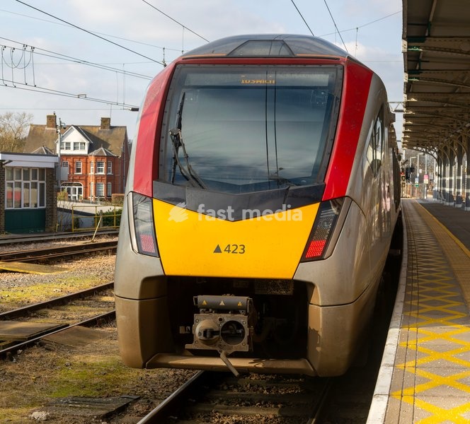 Greater Anglia, British Rail Class Stadler 755 bi-modal multiple unit passenger train arriving at Ipswich railway station, Suffolk, England, UK