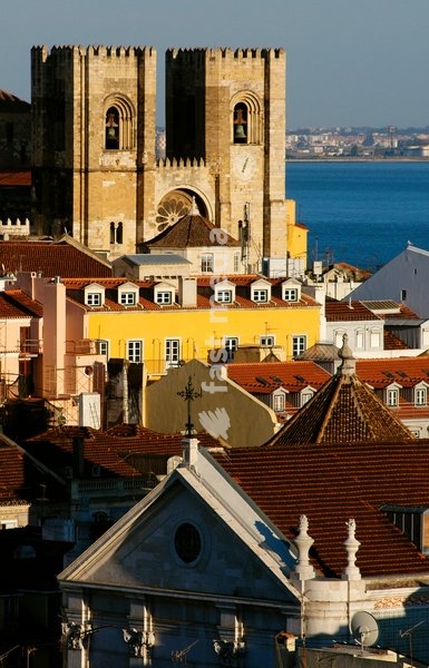 Cathedral and Alfama neighborhood, Lisbon, Portugal, 2008. View of the two towers flanking the facade of the cathedral, built shortly after Alfonso I conquered the city from the Muslims in 1147