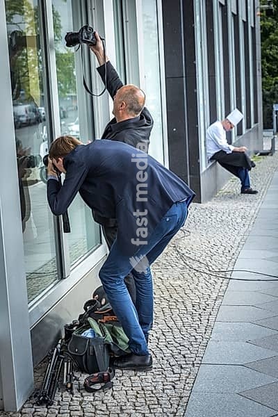 DEU Germany Germany Berlin AFD press conference on immigration and crime with Alice Weidel and Alexander Gauland. Photographers try to get a picture from outside