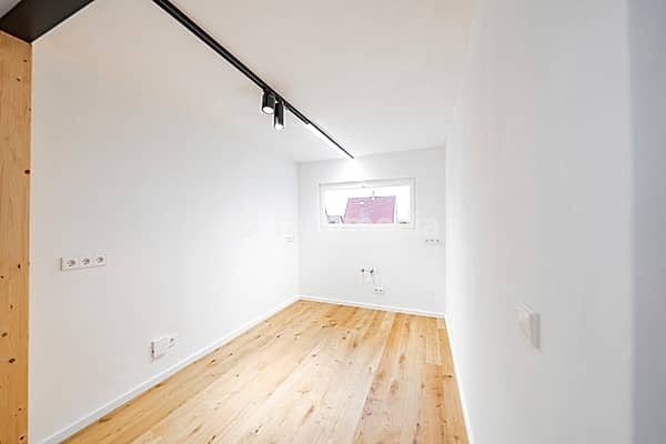 Light small room with oak floor and window, ready for furnishing and use, house renovation, energy renovation, Metzingen, Germany