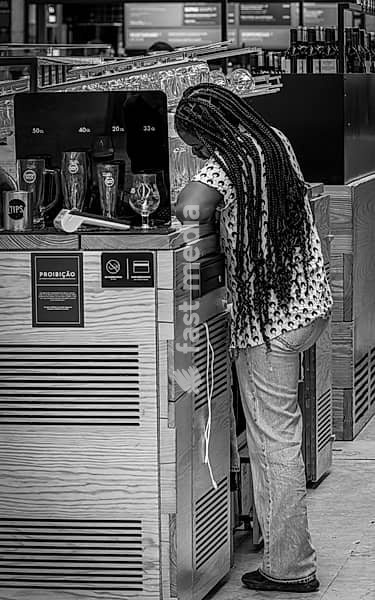 Black and white photography, street art, employees at the Time Out Market in the old town, Lisbon, Portugal