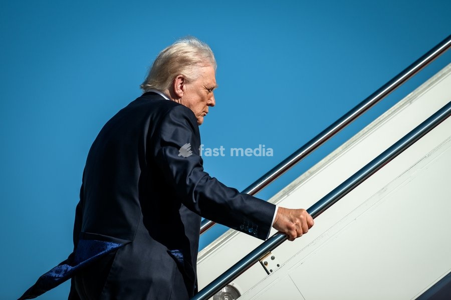 President Donald Trump boards Air Force One at Joint Base Andrews, Wednesday, November 5, 2025, en route to Miami, Florida