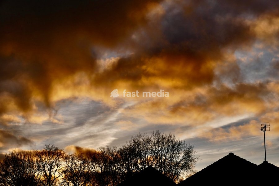 Dramatic skies at dusk as the days sun begins to set
