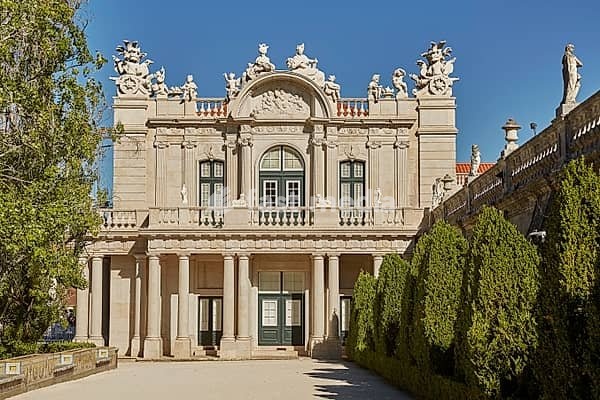 QUELUZ, SINTRA / PORTUGAL - OCOBER 02, 2017: Facade and gardens of Queluz Palace in Sintra, Portugal during summer day