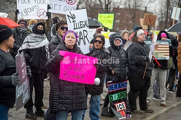 Detroit, Michigan USA - 13 January 2026 - Hundreds of protesters rallied in the rain outside the Motor City Casino as President Donald Trump spoke to the Detroit Economic Club inside