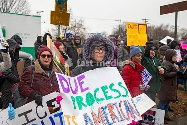 Detroit, Michigan USA - 13 January 2026 - Hundreds of protesters rallied in the rain outside the Motor City Casino as President Donald Trump spoke to the Detroit Economic Club inside