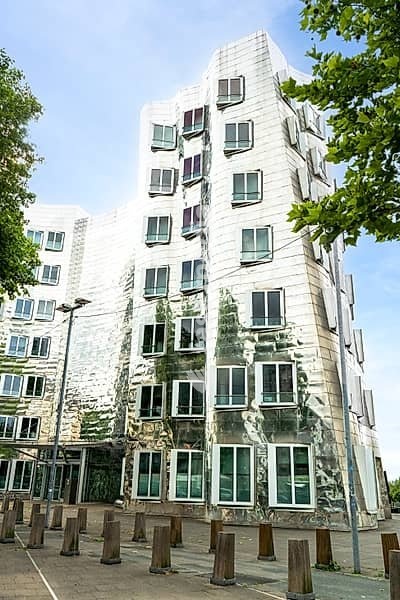 Modern deconstructivist architecture of the Neuer Zollhof building designed by Frank Gehry in Düsseldorf Germany