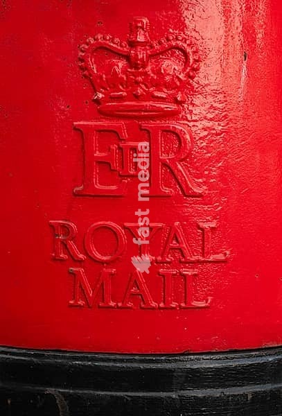 Red Royal Mail mailbox with crown and royal monogram, London, England, Great Britain