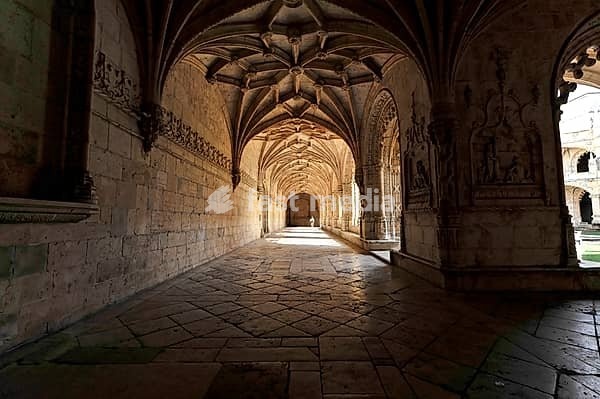 Santa Maria Church, Mosteiro dos Jéronimos, Jeronimos Monastery, UNESCO World Heritage Site, Belem Quarter, Lisbon, Portugal, light-filled stone cloister with detailed vaulted ceiling, Lisbon, Portugal