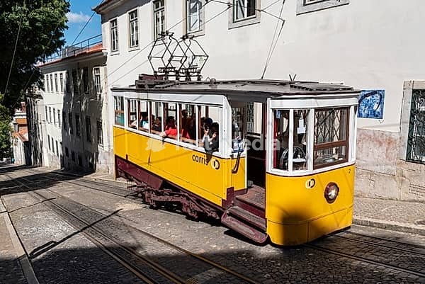 Lisboa, Portugal - June 04, 2024 - Iconic Elevador da Gloria in old town Lisbon winds its way up the alleyway, Portugal