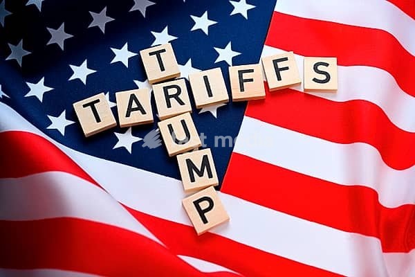 Letters on the US flag form the words Trump and Tariffs, Trump Tariffs +++ for editorial use only