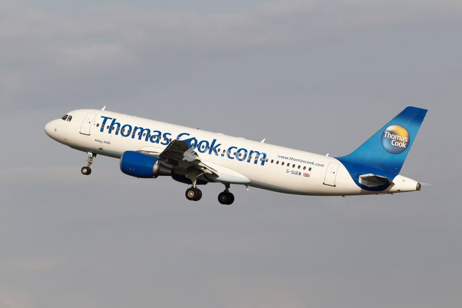 Thomas Cook Airlines Airbus A320-214 taking off at Stansted Airport, Essex, England, United Kingdom