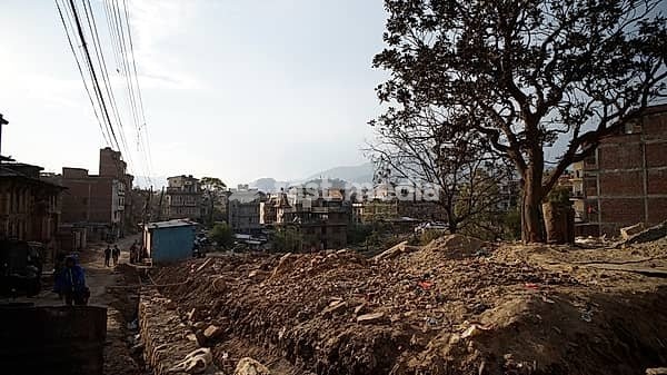 Debris and debris from collapsed buildings, an entire street destroyed by the earthquake, Kathmandu, Nepal