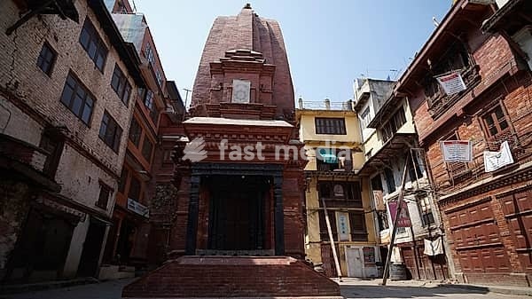 A traditional temple in Durbar Square, houses are supported with beams just after the earthquake in Kathmandu, Nepal