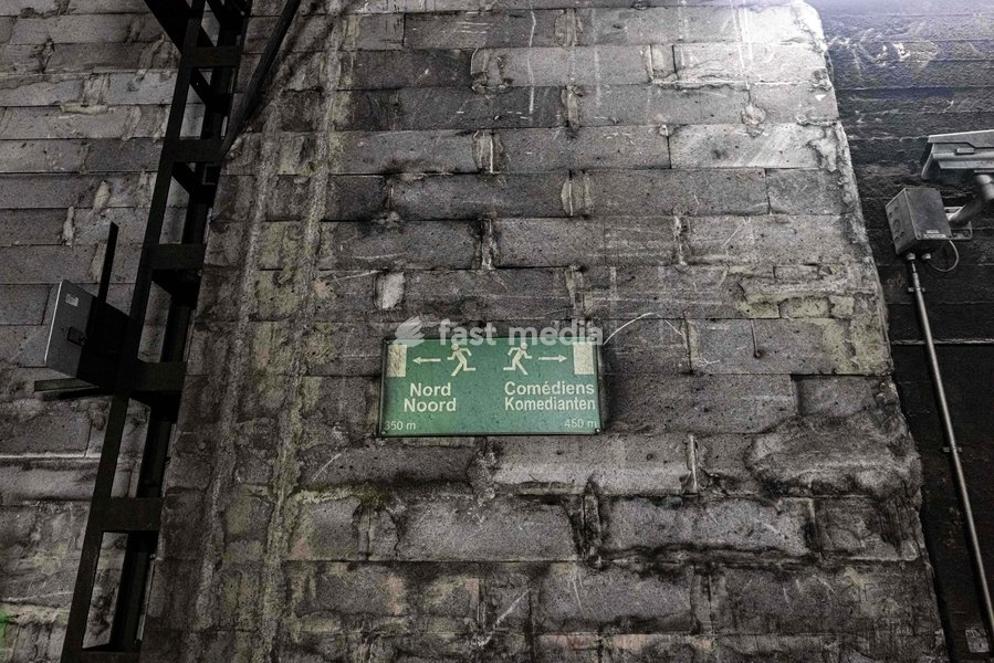 A sign is seen inside a tunnel during a tour of the major works in the North-South junction tunnels in Brussels, organised by Infrabel, on Friday 06 March 2026.This weekend, Infrabel is carrying out major works between Brussels North and Brussels South stations, Among other things, technical teams…