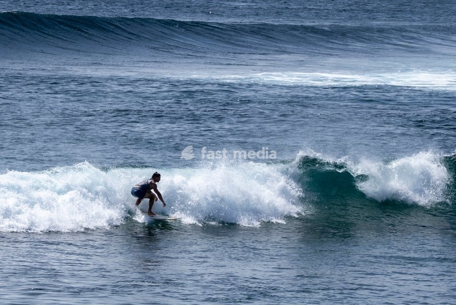 Surfing in Hanga Roa, Easter Island, Rapa Nui, Chile