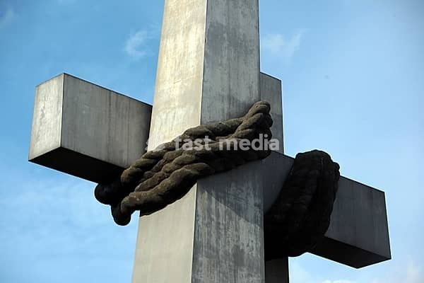 A monument to the victims of june 1056 in the old town of Poznan in Poland in east Europe