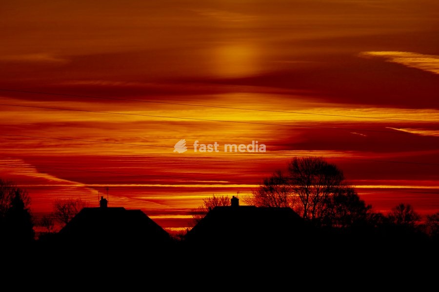 The days sun rises over the countryside