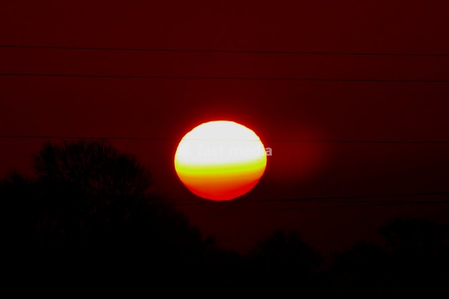 The days sun rises on a cold morning in the countryside