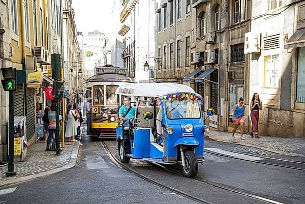 A traditional Lisbon Tram on the streets of Alfama in the City of Lisbon in Portugal. Portugal, Lisbon, October, 2021