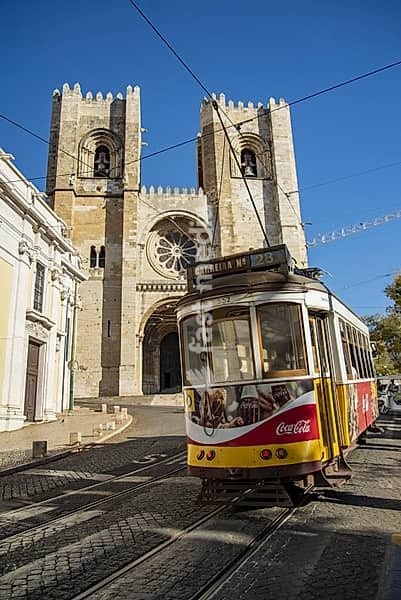 A traditional Lisbon Tram on the streets of Alfama in the City of Lisbon in Portugal. Portugal, Lisbon, October, 2021