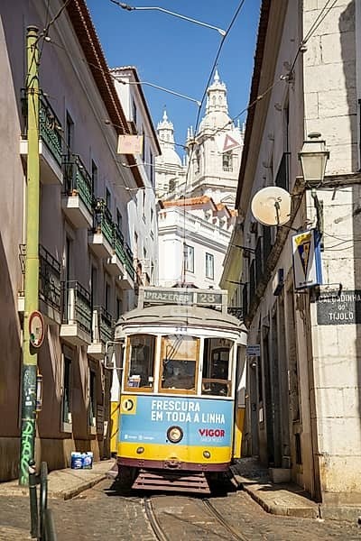 A traditional Lisbon Tram on the streets of Alfama in the City of Lisbon in Portugal. Portugal, Lisbon, October, 2021