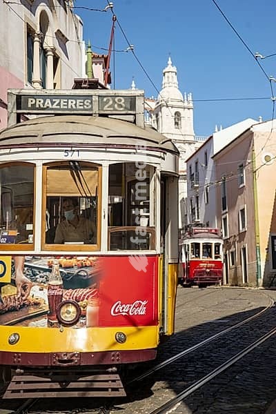 A traditional Lisbon Tram on the streets of Alfama in the City of Lisbon in Portugal. Portugal, Lisbon, October, 2021