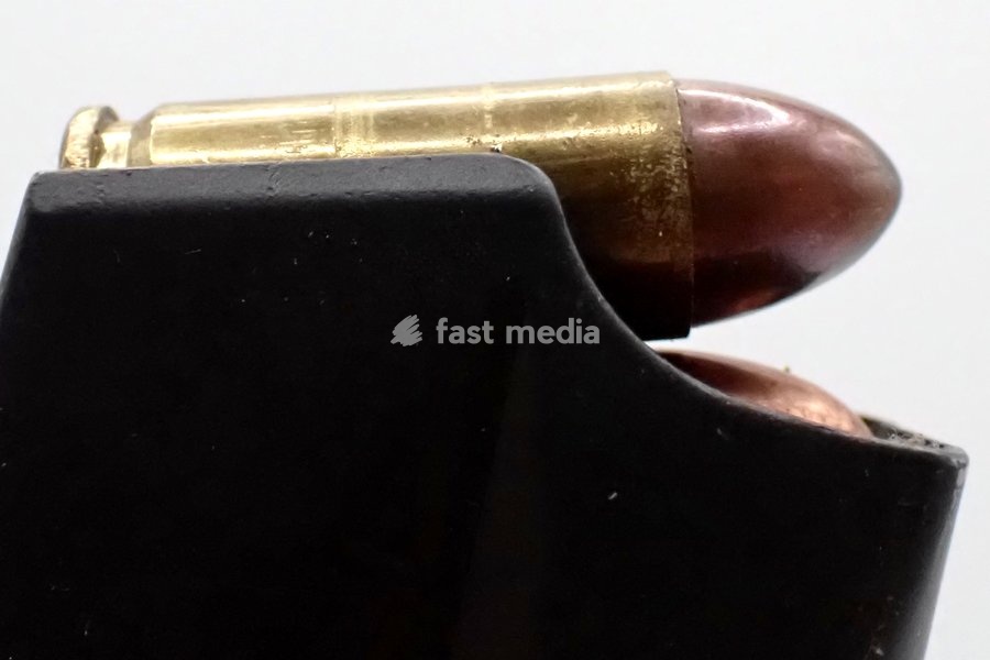 In this illustration photo. A 9x21mm pistol bullet inserted into a magazine