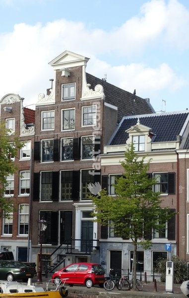Typical 17th century residential houses alongside a canal in Amsterdam