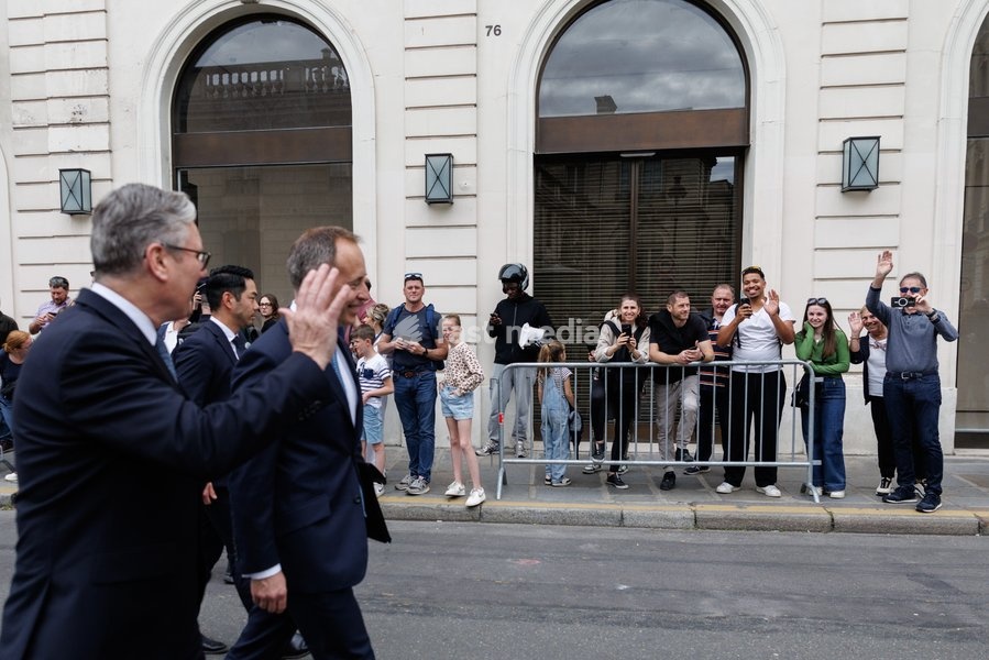 17/04/2026. Paris, France. Prime Minister Keir Starmer and British Ambassador to France Thomas Drew walk to the British Embassy after the Prime Minister and French President Emmanuel Macron co-host the Strait of Hormuz Summit at the Elysee Palace