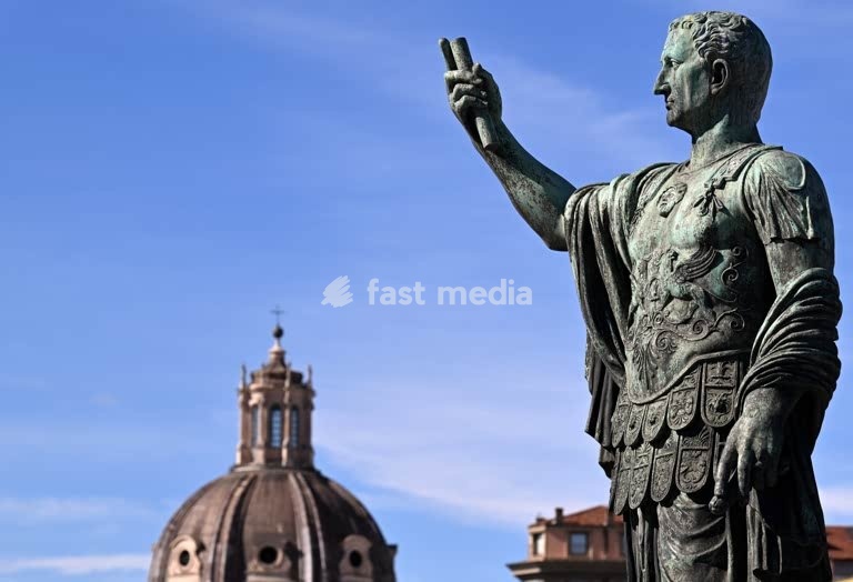 Statue of the Roman emperor Nerva (born Marcus Cocceius Nerva; reign 96-98 AD). in the Via dei Fori Imperiali in front of the Nerva’s Forum. - Rome, Italy (2026)