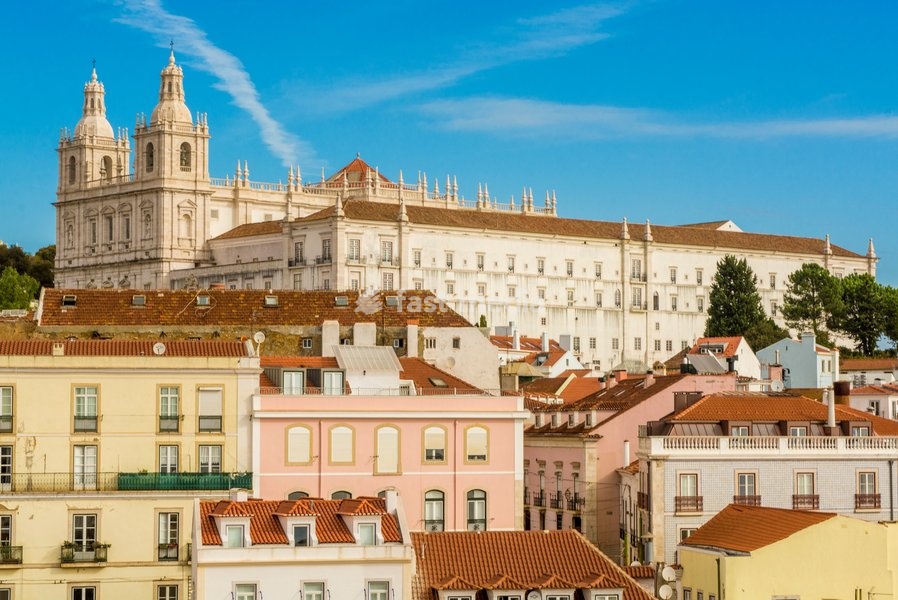 Skyline with Monastery of St. Vincent or Monastery of Sao Vicente de Fora on the hill, Alfama district, Lisbon, Portugal