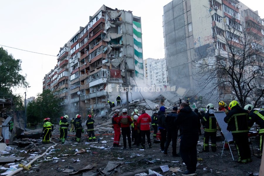 First responders carry out emergency operations at nine-storey apartment blocks damaged by a Russian missile and drone strike in Kyiv, Ukraine, on May 14, 2026. Russia launched a massive attack on the Ukrainian capital, deploying more than 670 strike drones and 56 missiles of various types. The…