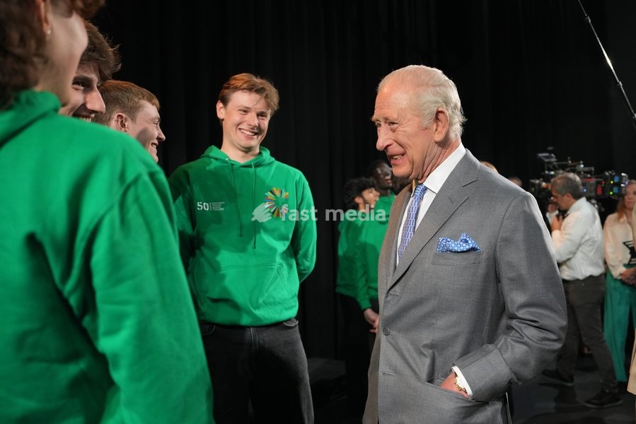Britain's King Charles III meets students taking part in workshops organised by National Youth Music Theatre (NYMT) at The Other Palace in London, Thursday, May 14, 2026