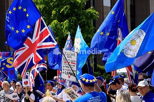 Belgium, Brussels, on July 09, 2019: Pro-European and anti-Brexit English demonstration in front of the European Commission headquarters. Demonstrations with flags of the United Kingdom and European flags, Bretagne, Brittany, Morbihan 56, Brussels-Capital Region, Europe, Western Europe, Belgium
