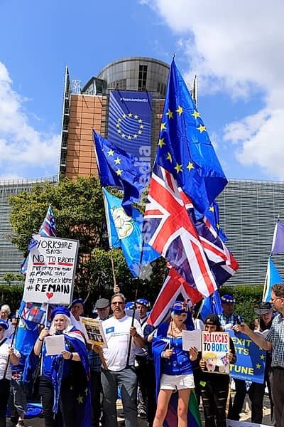 Belgium, Brussels, on July 09, 2019: Pro-European and anti-Brexit English demonstration in front of the European Commission headquarters. Demonstrations with flags of the United Kingdom and European flags, Bretagne, Brittany, Morbihan 56, Brussels-Capital Region, Europe, Western Europe, Belgium