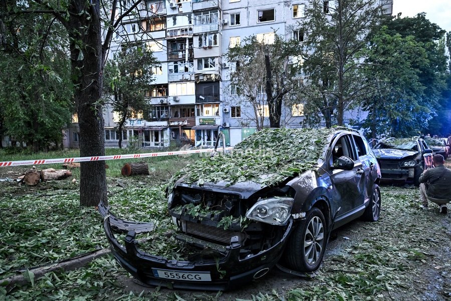 Cars, parked outside a residential building, are damaged by a Russian drone strike on the Shevchenkivskyi district of Zaporizhzhia, Ukraine, June 4, 2026. Russian forces launched a drone strike on one of the city’s residential areas, killing one person and injuring 16 others. The blast wave and…