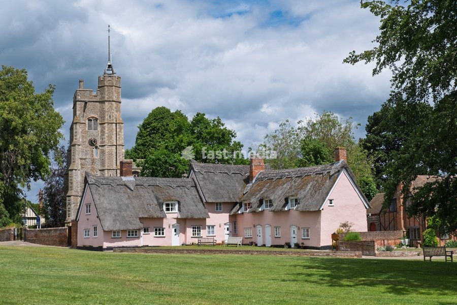 St Mary the Virgin church and 16 th Century cottages by the green in Cavendish, near Bury St Edmunds, Suffolk. United Kingdom. 05 June 2026