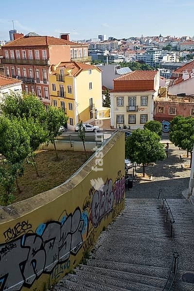 LISBON, PORTUGAL - JUNE 25, 2016: The stairs covered with the graffiti leading down to residential houses in the Bairro Alto - central district of Lisbon. Portugal