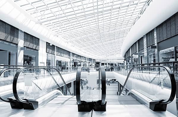 Panoramic view of a modern mall and escalator