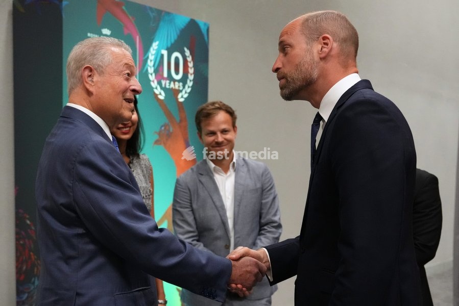 Britain's Prince William shakes hands with former US Vice President Al Gore during a reception at a Business Forum for The Royal Foundation's United for Wildlife in London, Monday, June 22, 2026