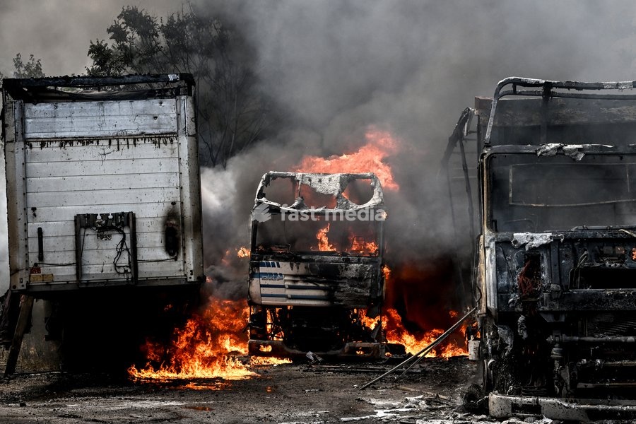 Trucks are engulfed by smoke from a fire at a parking lot, caused by Russian drone strikes, Zaporizhzhia, Ukraine, June 25, 2026. The Russian army attacked the city with strike drones, targeting a petrol station, Ukrzaliznytsia (Ukrainian Railways) locomotives and a parking lot. Fires broke out,…