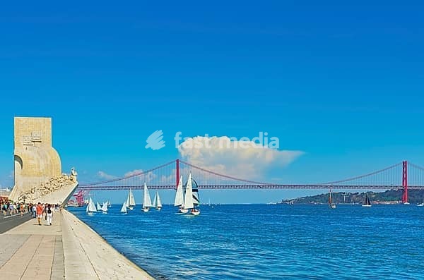 View of Ribeira das Naus esplanade and Monument to the Discoveries in the distance, Belem, Lisbon, Portugal