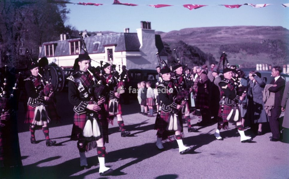 Pipers sounding 'The Retreat', Portree, Isle of Skye, Scotland, c1955